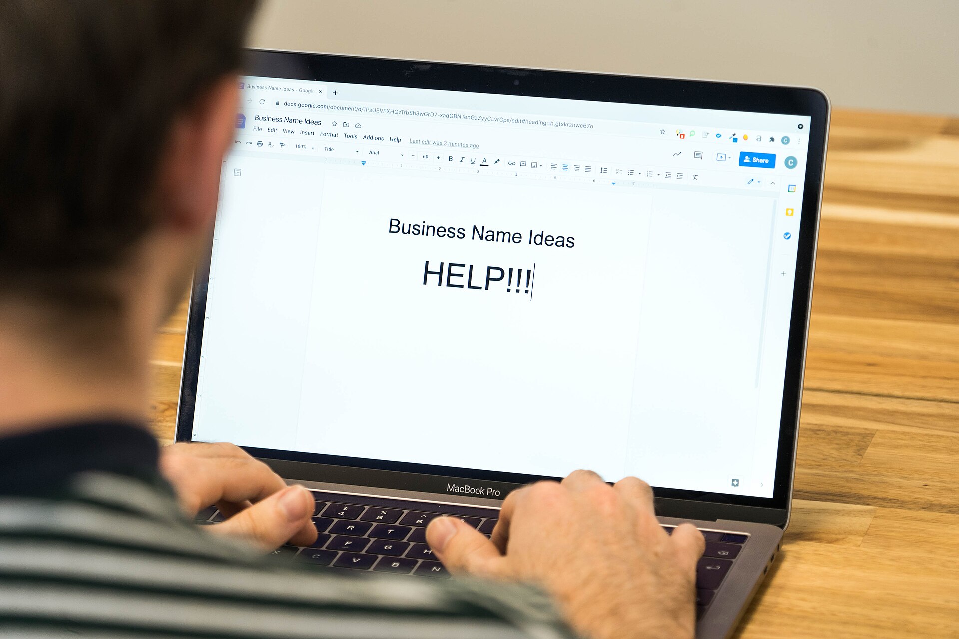 A photo of a potential business owner thinking of a business name but needs help. You can use this image as you please all we ask is that you provide credit by linking back to: customneon.co.uk/. This image is under creative commons licesning.