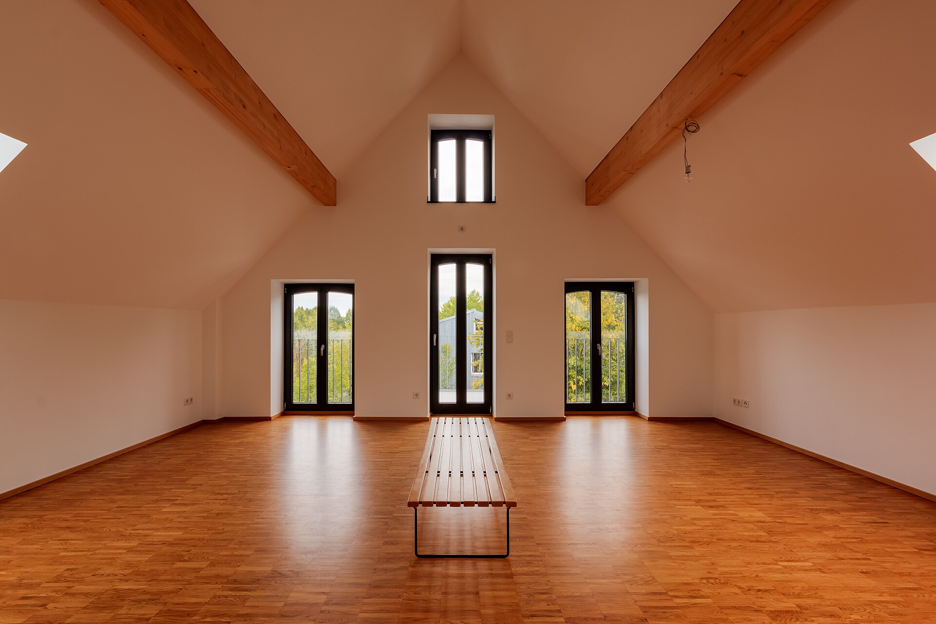 Interior (apartment) of the old distillery Löhning, Dülmen, North Rhine-Westphalia, GermanyThe Löhning distillery was a traditional grain distillery in Dülmen and is a prime example of the long distilling tradition in the Münsterland region.Its origins date back to the 19th century, when many farms began processing surplus grain into grain brandy. The Löhning family also took advantage of this opportunity and developed an independent distillery from a secondary agricultural business. The main product was grain brandy – typical for Westphalia – made from regional rye or wheat.Over the decades, the company modernized its technology, but remained artisanal in character. Like many smaller distilleries, Löhning had to compete with large industrial producers in the 20th century. Thanks to its regional roots, consistent quality, and traditional recipes, the distillery was able to maintain its position in the local market.The Löhning distillery in Dülmen was closed in 1989. The building was then renovated in accordance with historic preservation guidelines and converted into a KfW efficiency house, among other things.