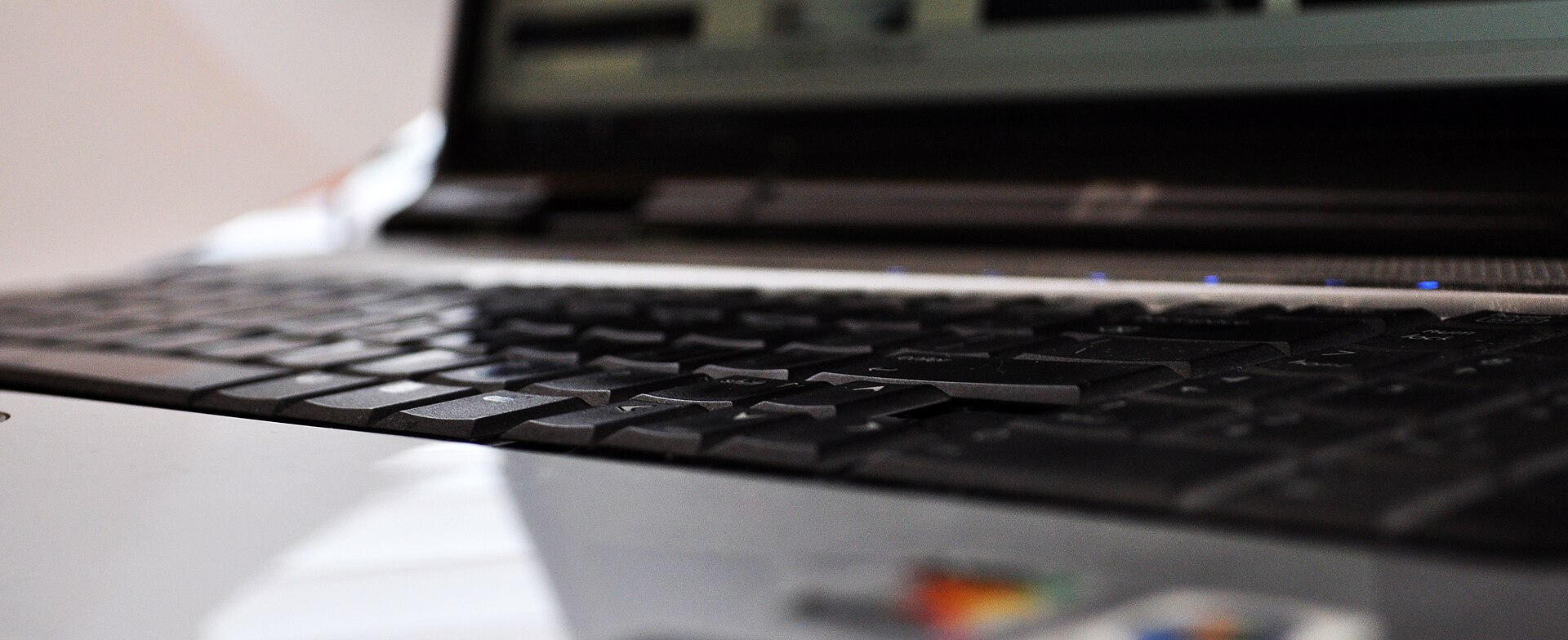 Closeup photographs of the keyboard of an HP Pavilion Entertainment PC notebook computer.