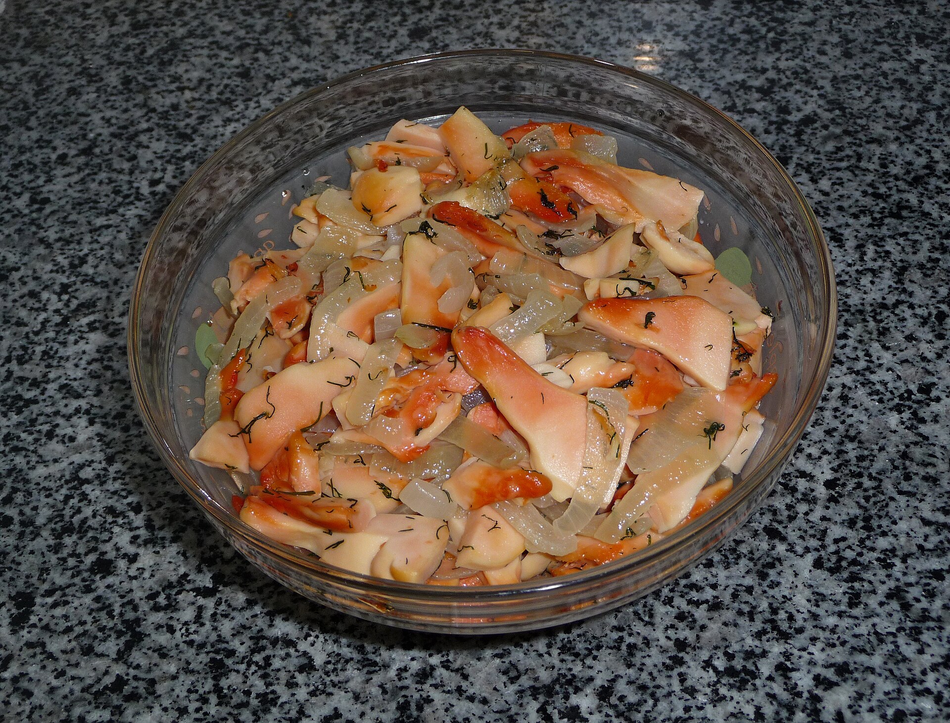 Sulphur polypore (Laetiporus sulphureus), prepared dish. This mushroom also called "chicken polypore" and "chicken-of-the-woods". At cooking yellow-colored fungi becomes pink.