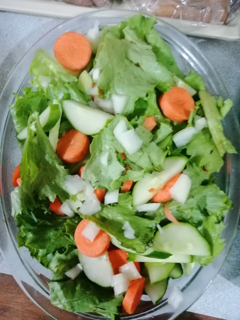 Lettuce, carrot and cucumber in plate